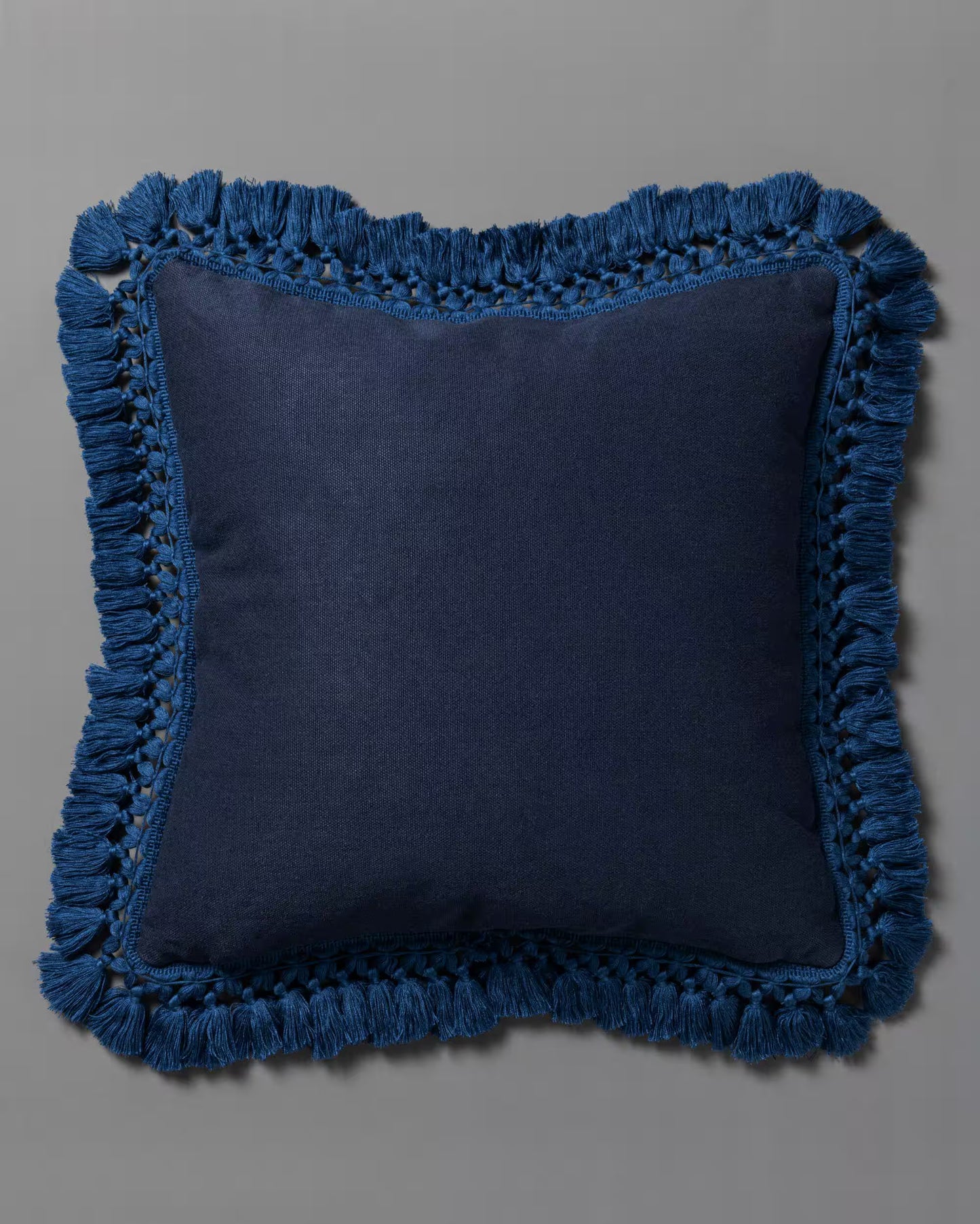 A SWALLOW'S HORIZON embroidered cushion