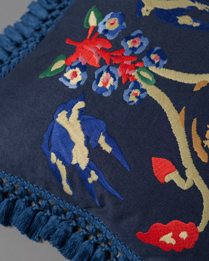 A SWALLOW'S HORIZON embroidered cushion