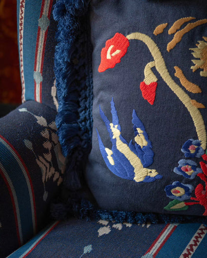 A SWALLOW'S HORIZON embroidered cushion